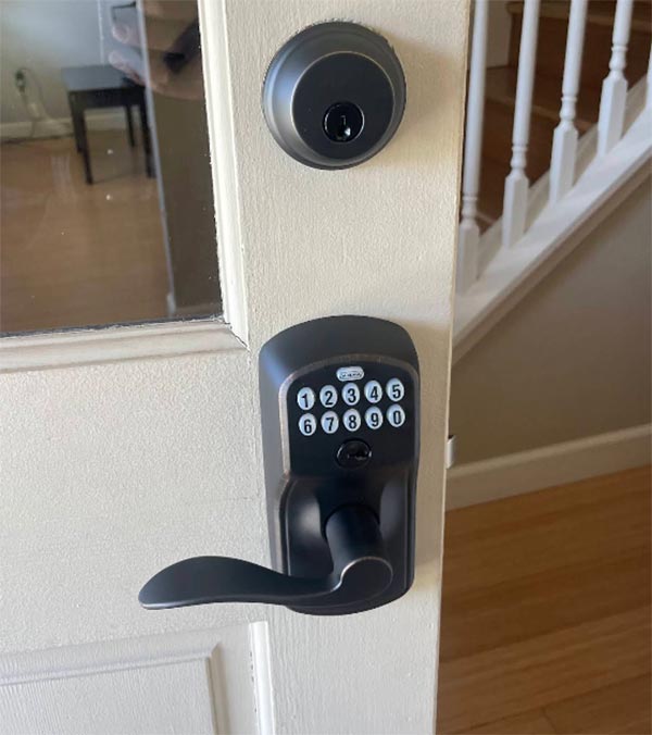 smartlock and matching deadbolt installation on residential front door smartlock and matching deadbolt installation on residential front door